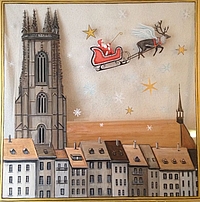 la cathédrale de Fribourg avec le père Noêl sur son traineau tiré par un renne
